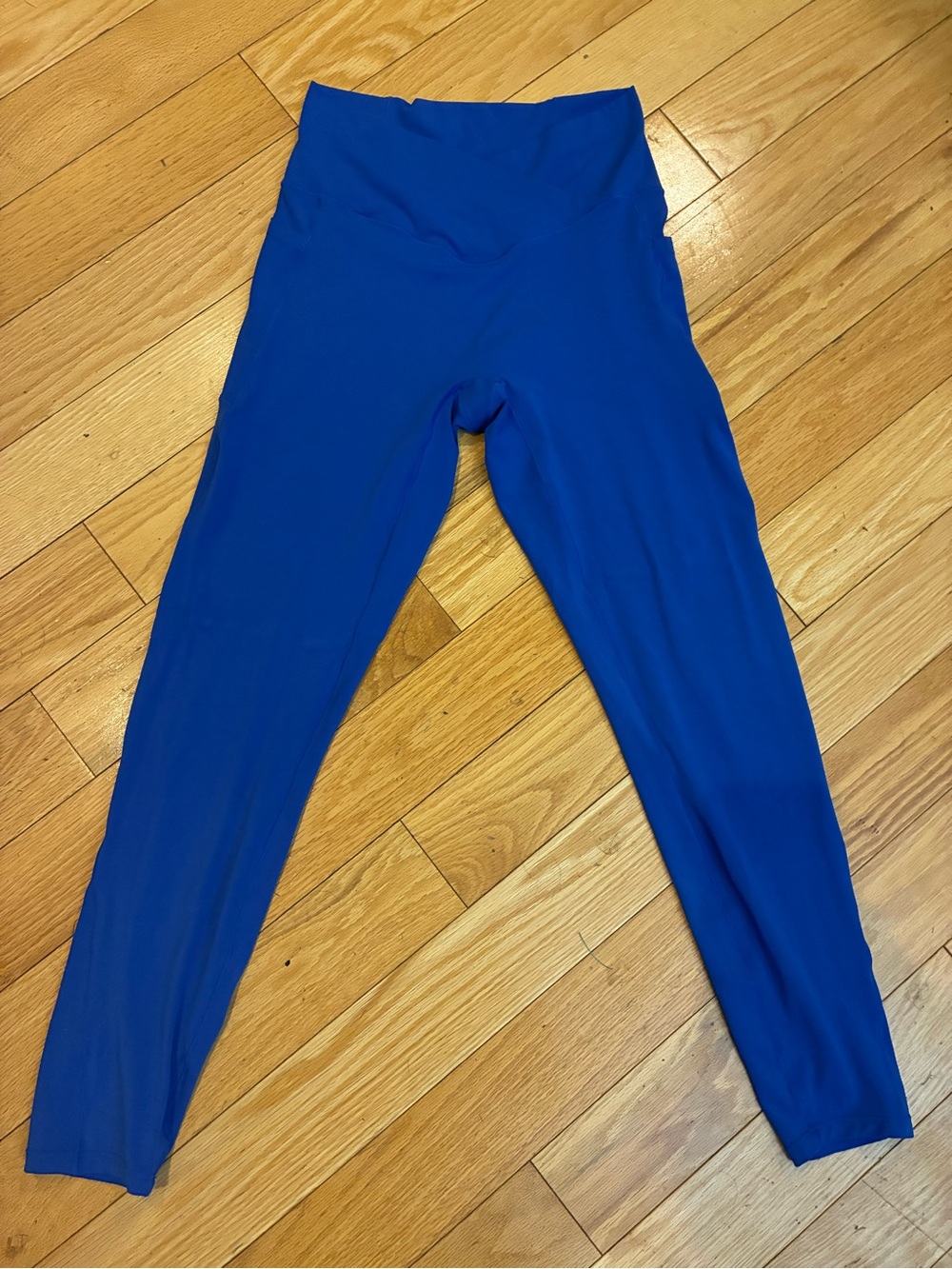 Halara Blue Leggings with pockets and cross over waist band